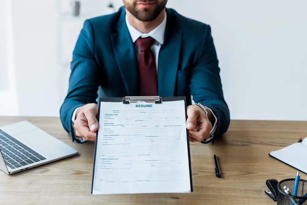 attorney handing in a resume